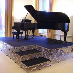 Staging with good weight loading is NexGen Portable staging, which can easily support a grand piano.